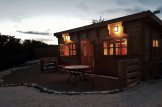 Log Cabin ALTURA F With A Flat Roof (34+34 mm), 31 m² With 8 m² Terrace customer 1