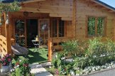 Log Cabin OLIVIA S (34+34 mm), 6x6 m (20'x20'), 27 m² With 8 m² Terrace customer 1